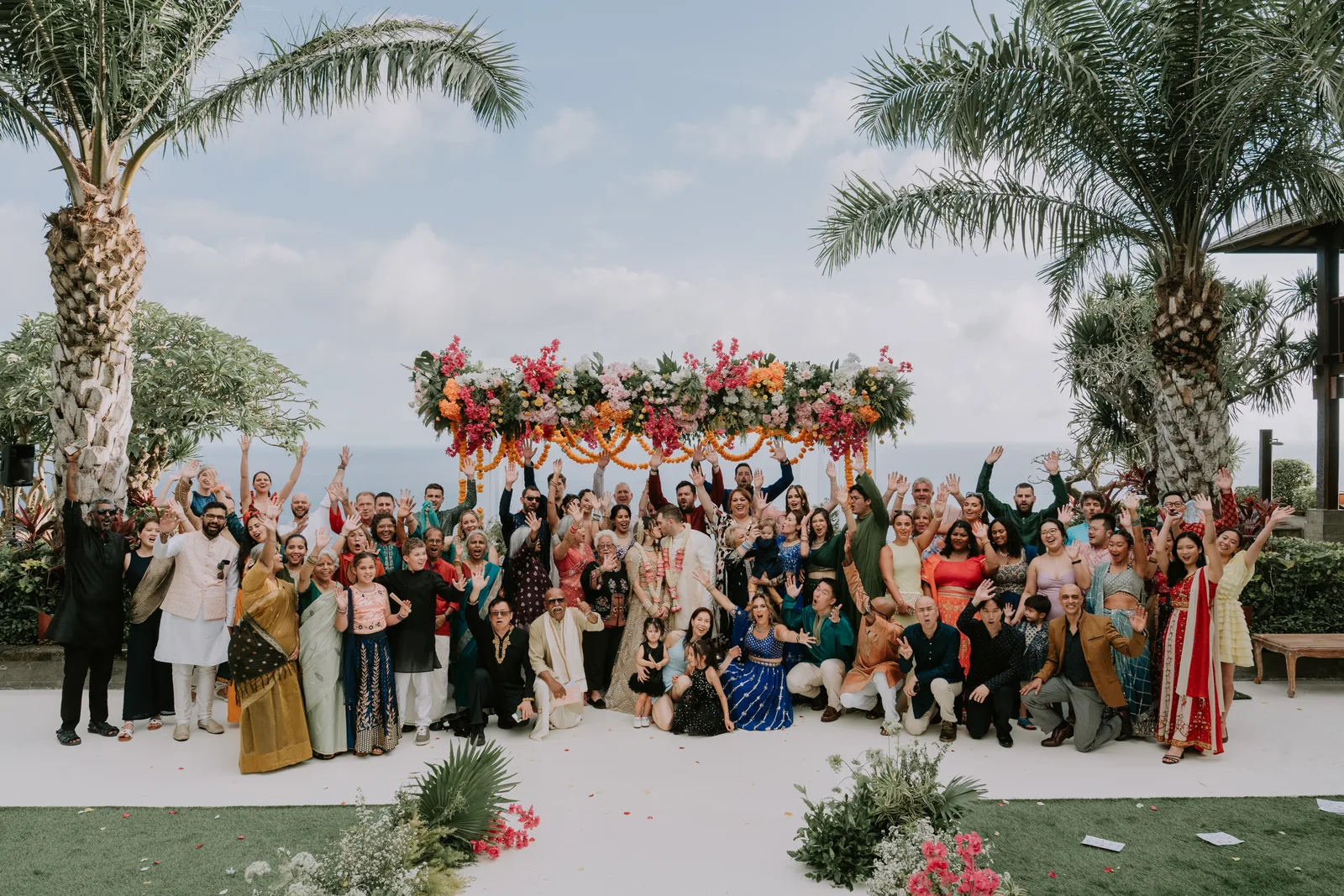 Guests gathered for a celebration on the clifftop lawn at Stones Villas Uluwatu