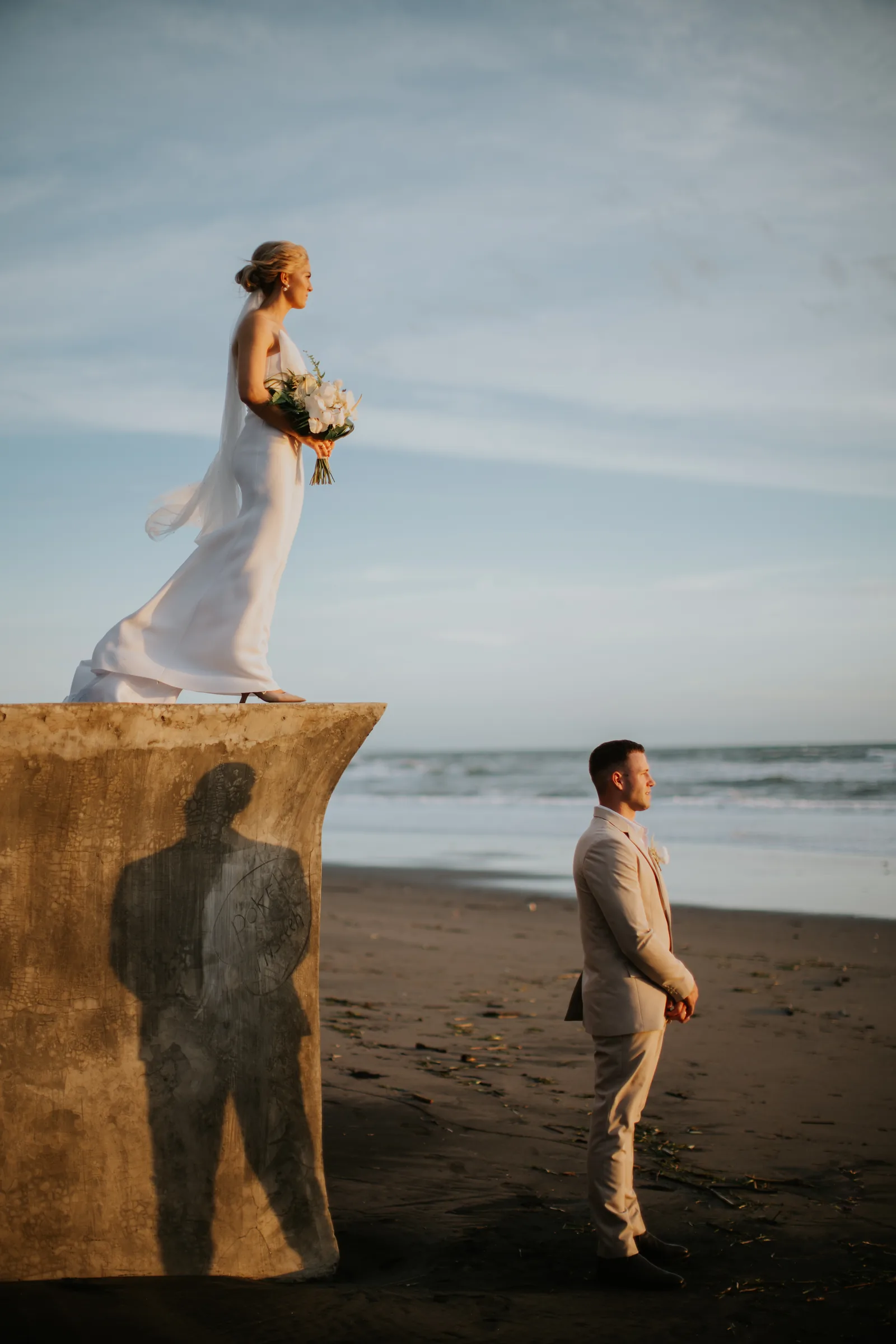 A couple on the sand at Villa Vedas at the end of the day